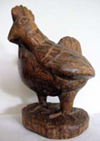 sculpture en bois d'une poule de Bresse